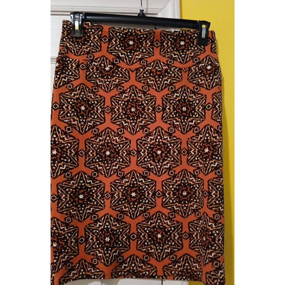Pre-Loved LuLaRoe Cassie Orange/Black Geometric Medallian Pencil Skirt. Size M.